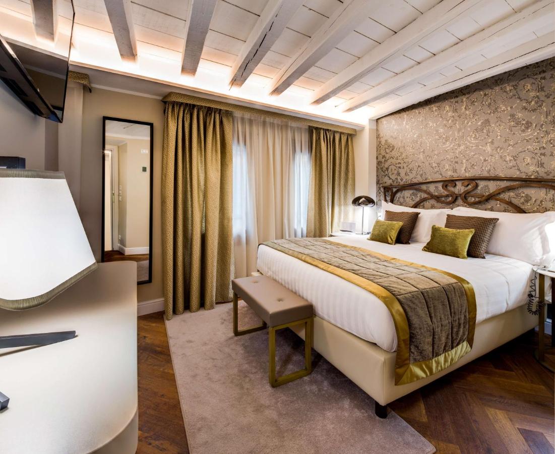 Camera da letto e arredi del BW Premier Collection CHC Continental, Cannaregio, Venezia