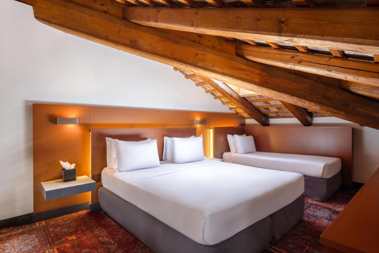 Camera da letto e arredi del Eurostars Residenza Cannaregio, Cannaregio, Venezia